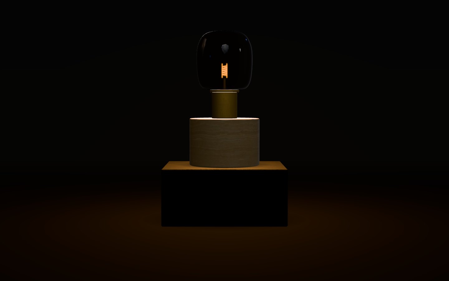 Hollow Moon: a short travertine lamp with a brushed brass collar and a smoked glass dome, the filament lit, standing on a dark stone block in a dark room.
